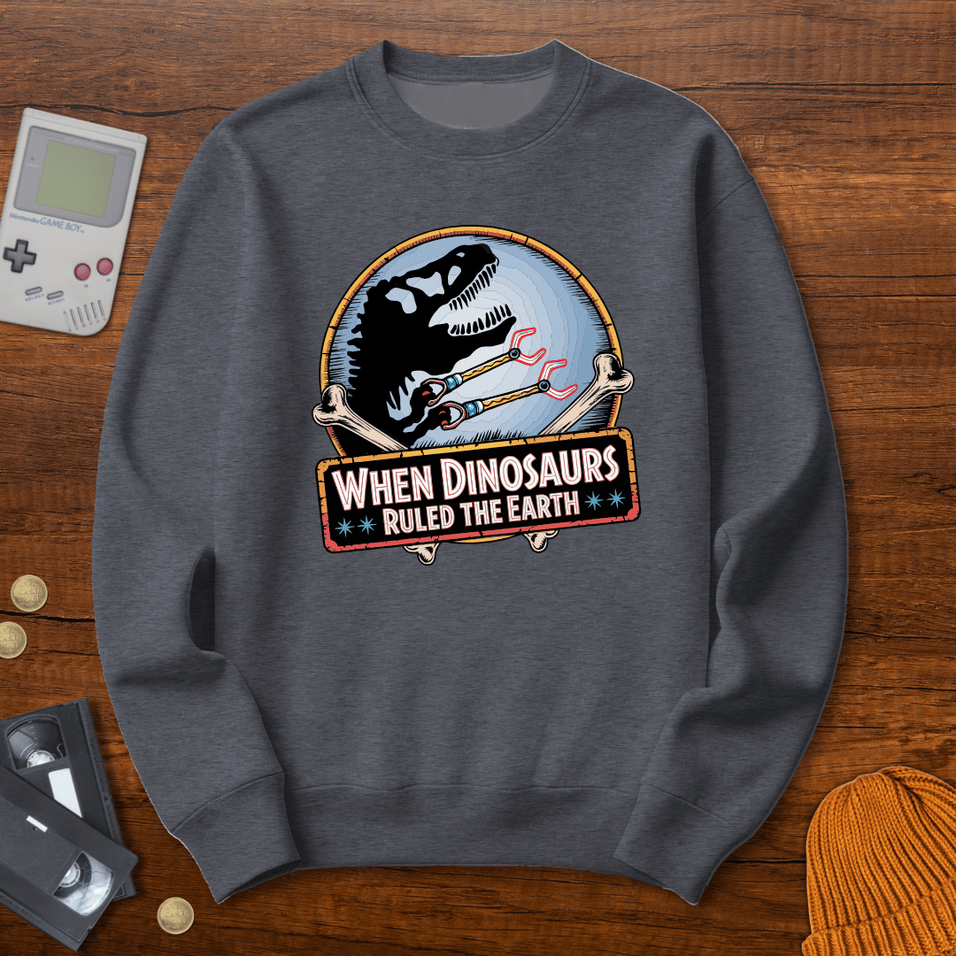 Printify Sweatshirt S / Graphite Heather When Dinosaurs Ruled the Earth - Sweatshirt