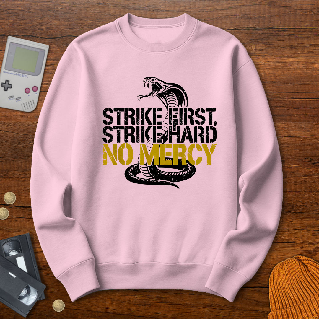Printify Sweatshirt S / Light Pink Strike First - Sweatshirt